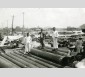 Débarquement et stockage des tuyaux pendant les inondations de Nankin en Chine, 1931