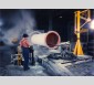 Machine à centrifuger les tuyaux de 1000 à 1500 mm de diamètre et de 7 mètres de long à l'usine de Pont-à-Mousson, 1956