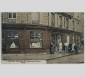 La boutique d'un miroitier parisien dépositaire des glaces Saint-Gobain au début du XXe siècle